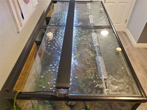The box says 30in, but the glass is actually less and it fits with the tank trim. . Diy aquarium lid hinge